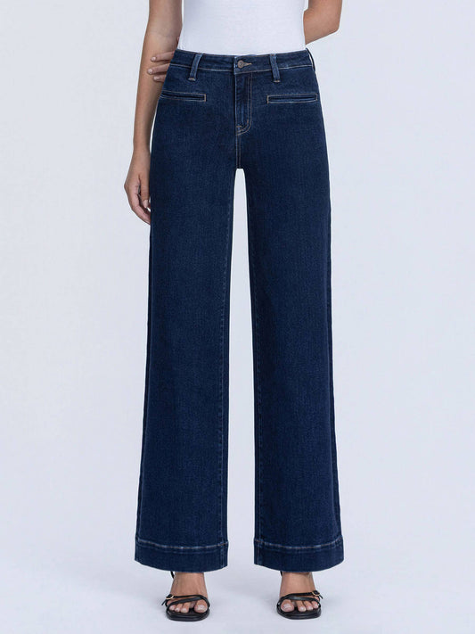Front detail of dark denim trouser jeans with welt pockets