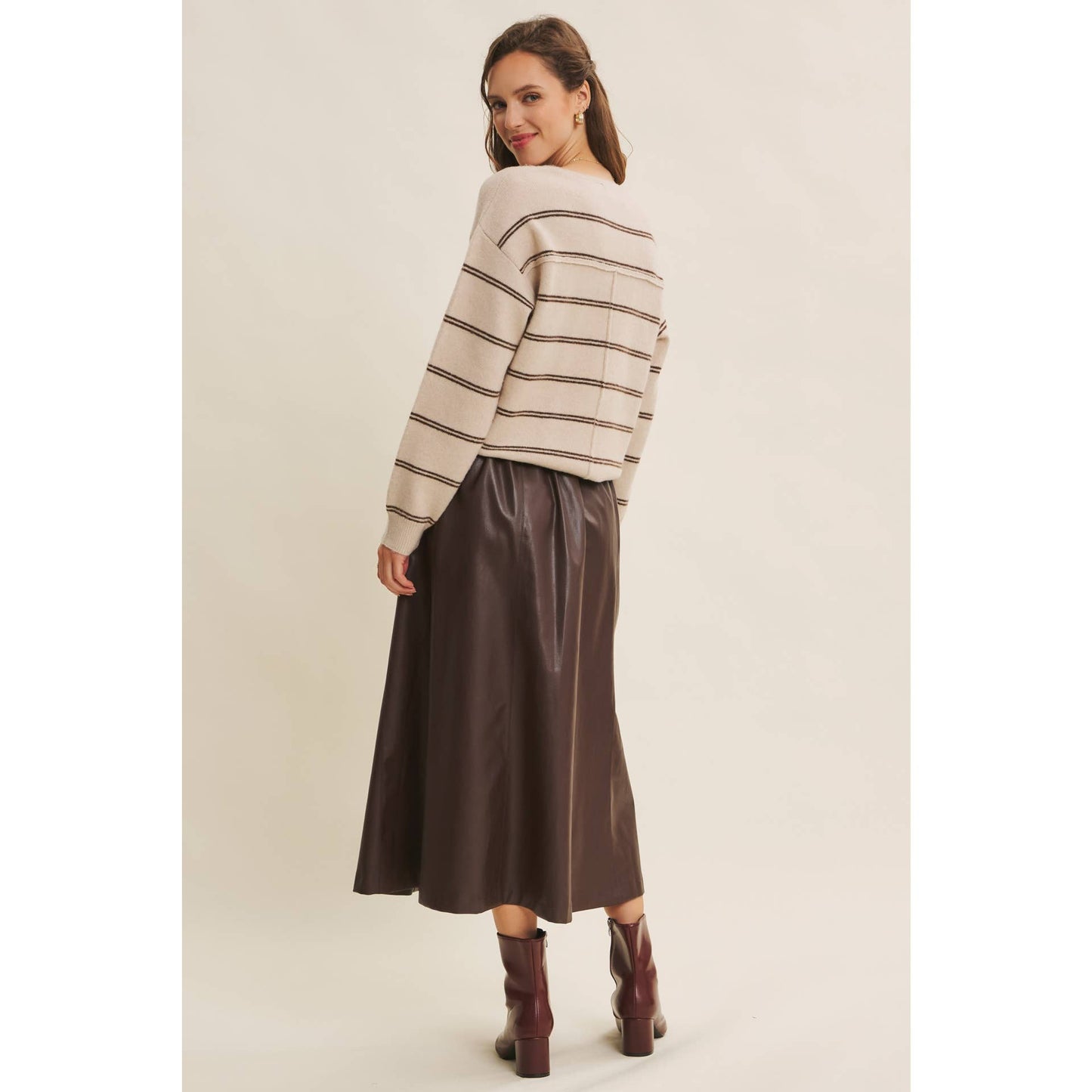 SOPHISTICATED VEGAN FAUX LEATHER BELTED MIDI SKIRT