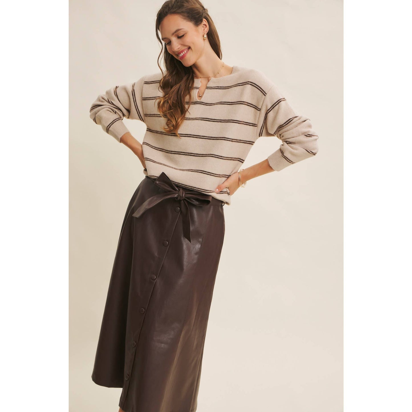 SOPHISTICATED VEGAN FAUX LEATHER BELTED MIDI SKIRT