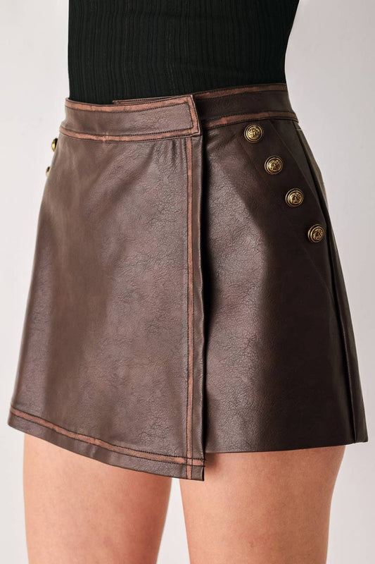 A faux leather skort