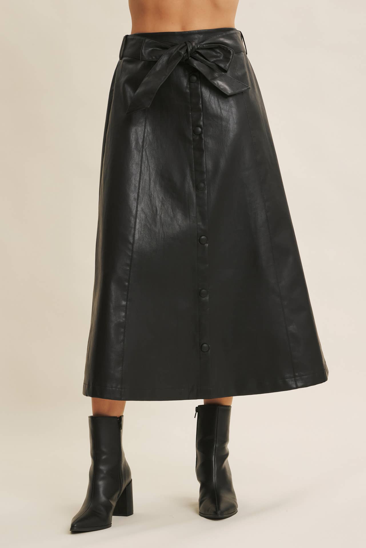 SOPHISTICATED VEGAN FAUX LEATHER BELTED MIDI SKIRT