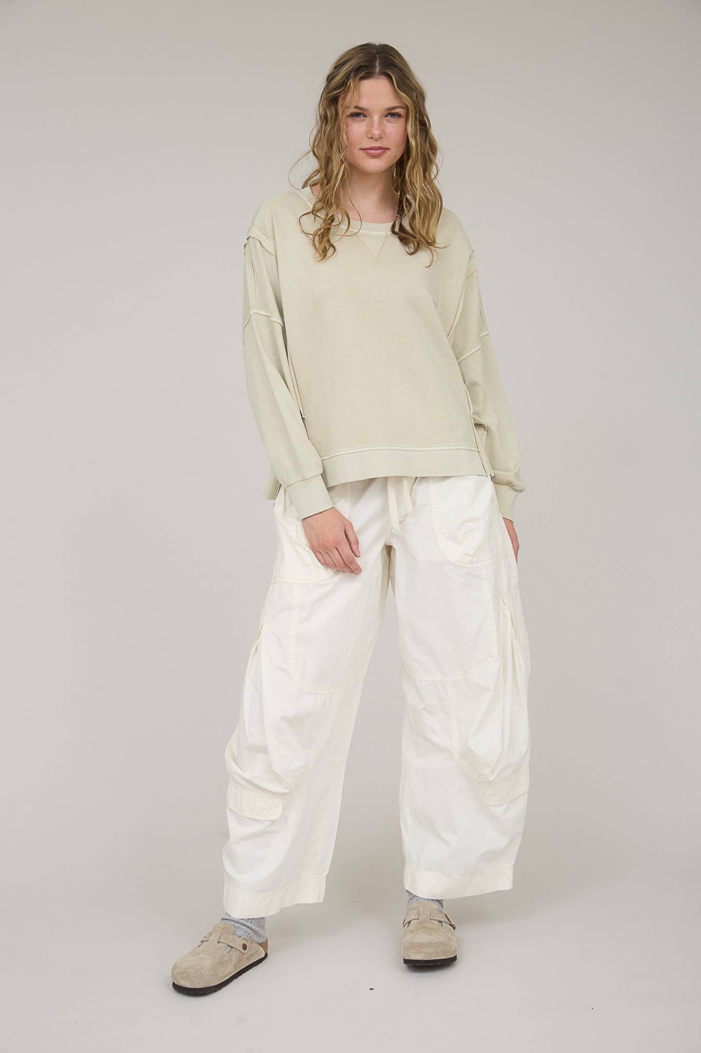 WASHED EXTENDED SHOULDER KNIT TOP