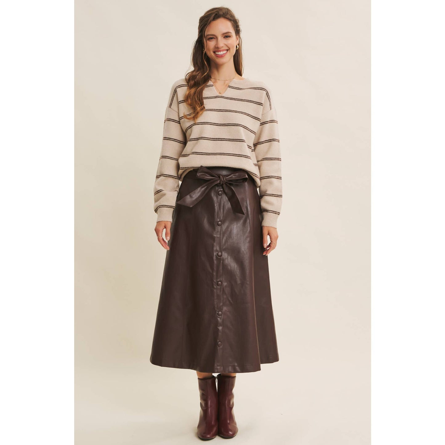 SOPHISTICATED VEGAN FAUX LEATHER BELTED MIDI SKIRT