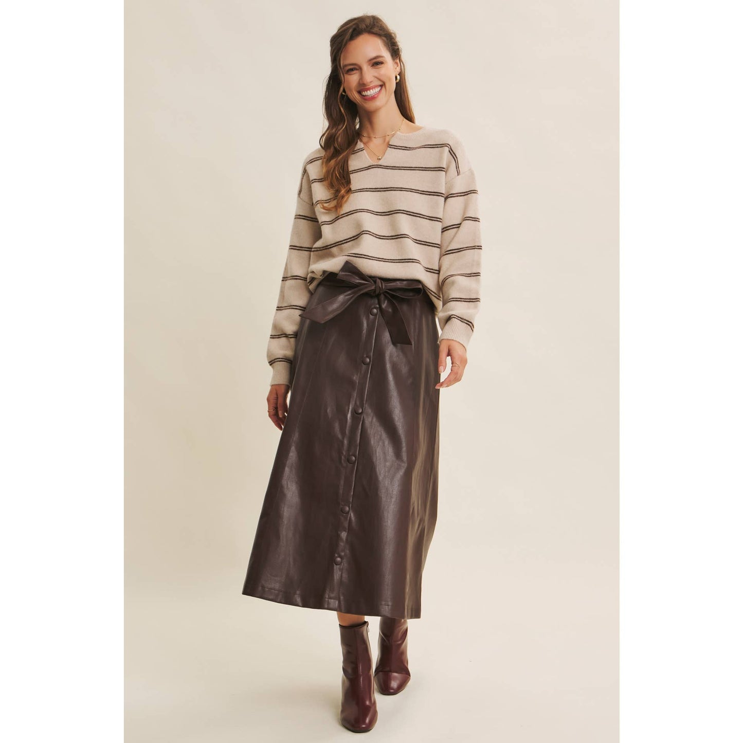 SOPHISTICATED VEGAN FAUX LEATHER BELTED MIDI SKIRT