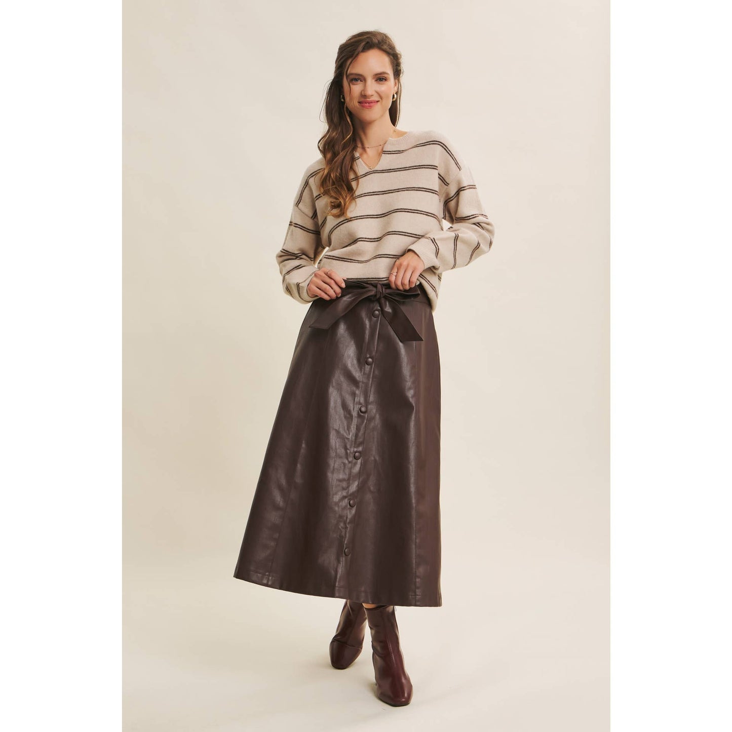 SOPHISTICATED VEGAN FAUX LEATHER BELTED MIDI SKIRT