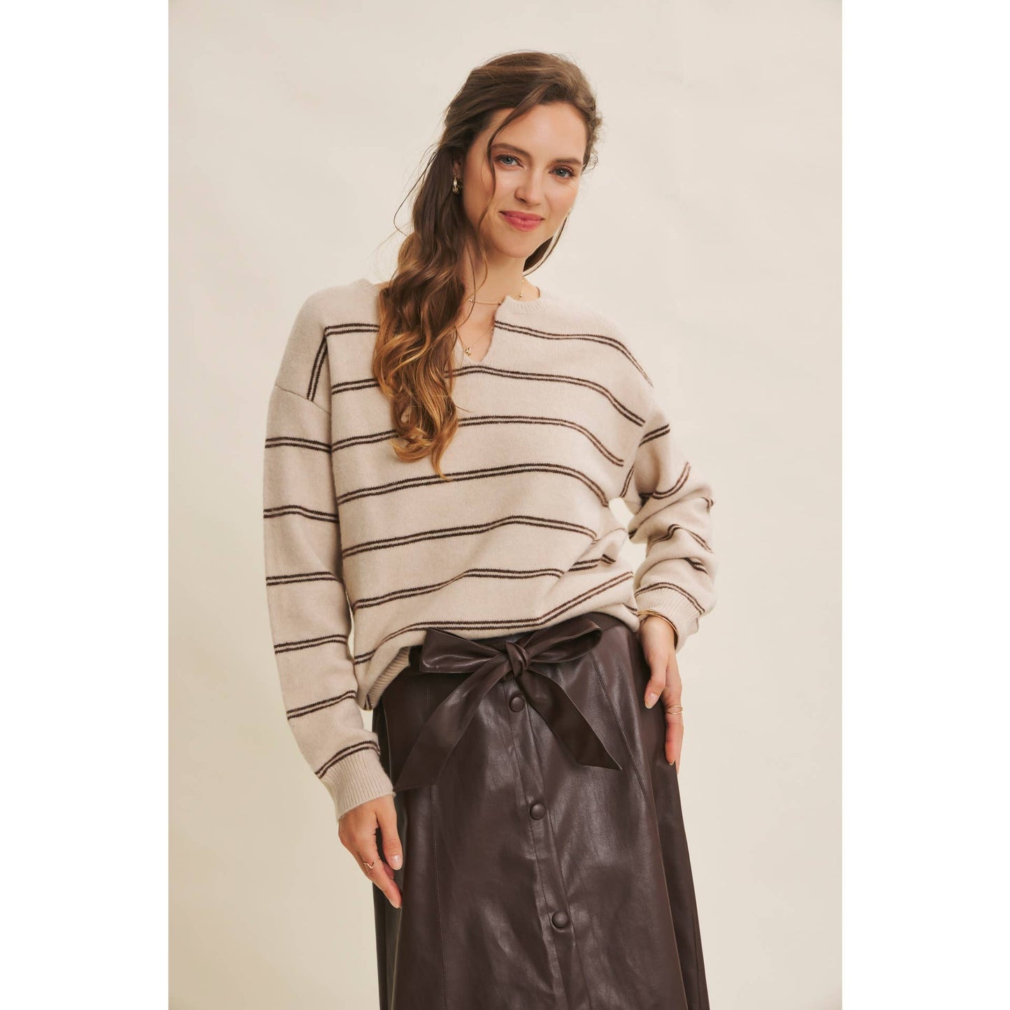 SOPHISTICATED VEGAN FAUX LEATHER BELTED MIDI SKIRT