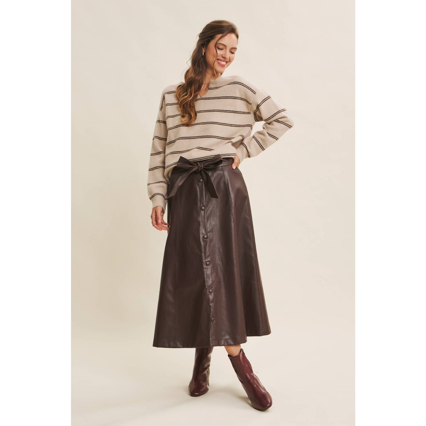SOPHISTICATED VEGAN FAUX LEATHER BELTED MIDI SKIRT