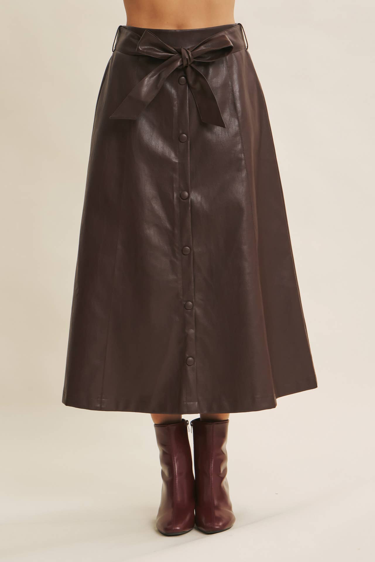 SOPHISTICATED VEGAN FAUX LEATHER BELTED MIDI SKIRT
