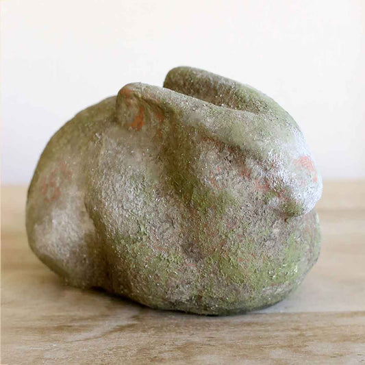 Antique green terracotta bunny decor with textured weathered finish