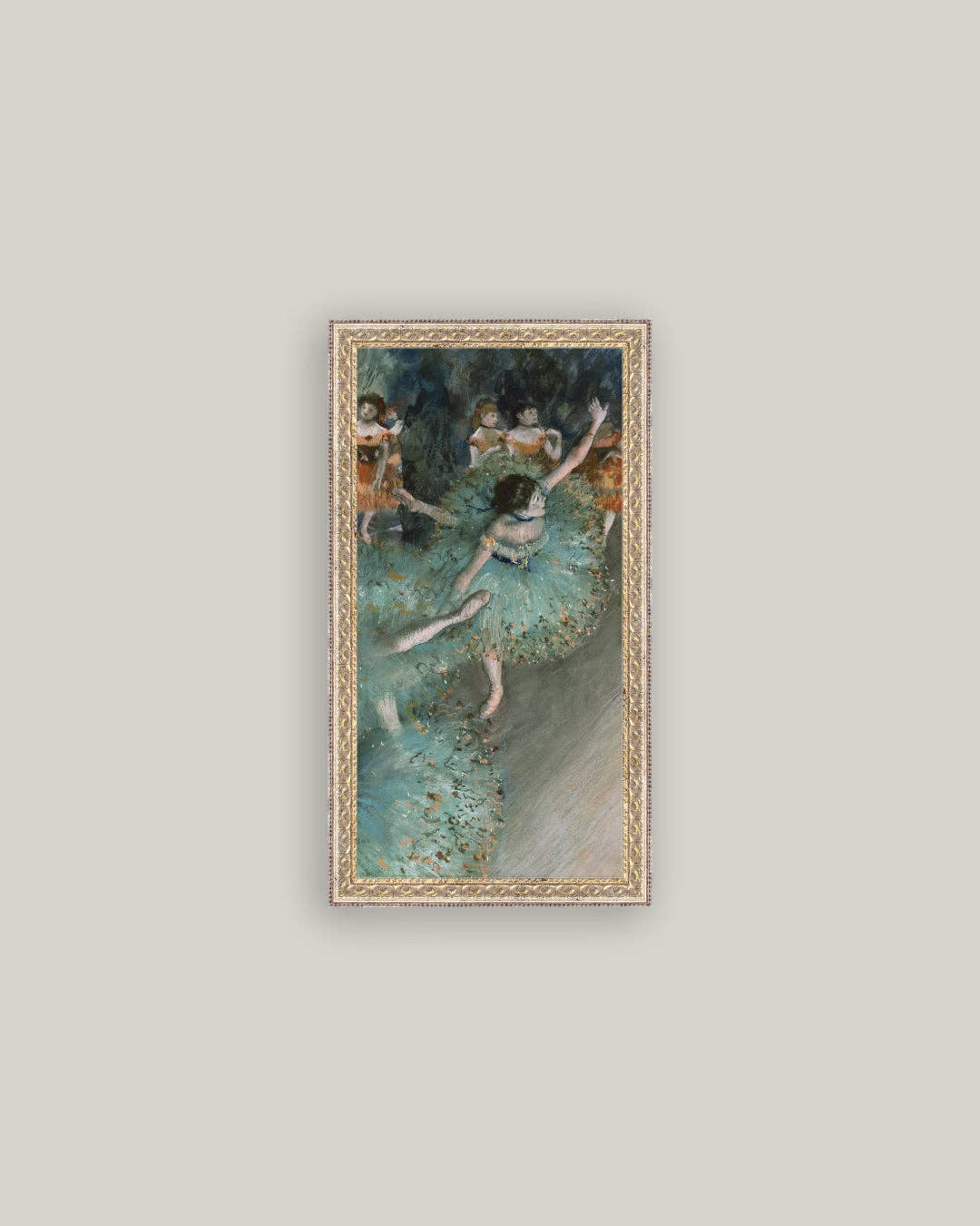 Vertical framed art print showing a ballerina in a green dress