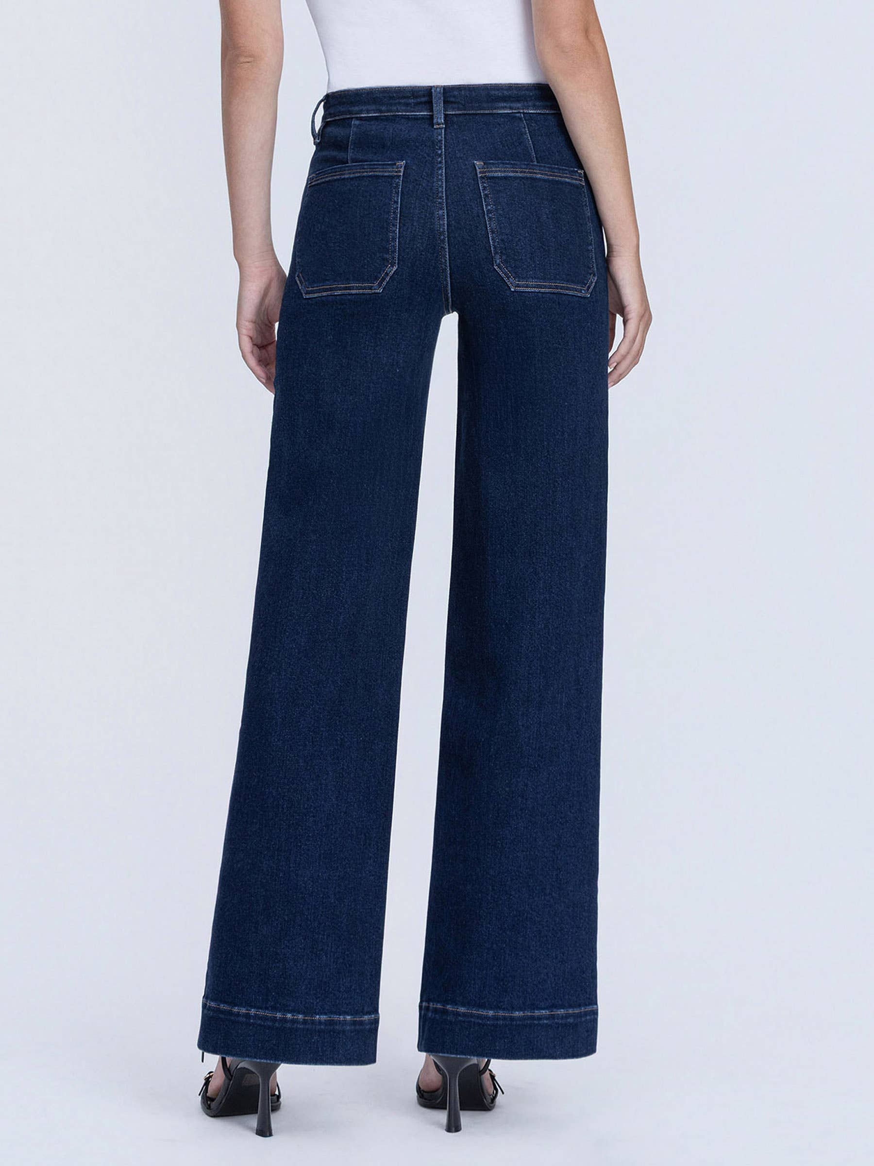 Back detail of dark wash wide leg jeans with patch pockets