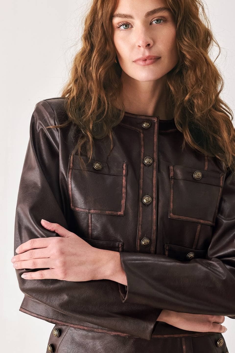 A faux leather cropped jacket