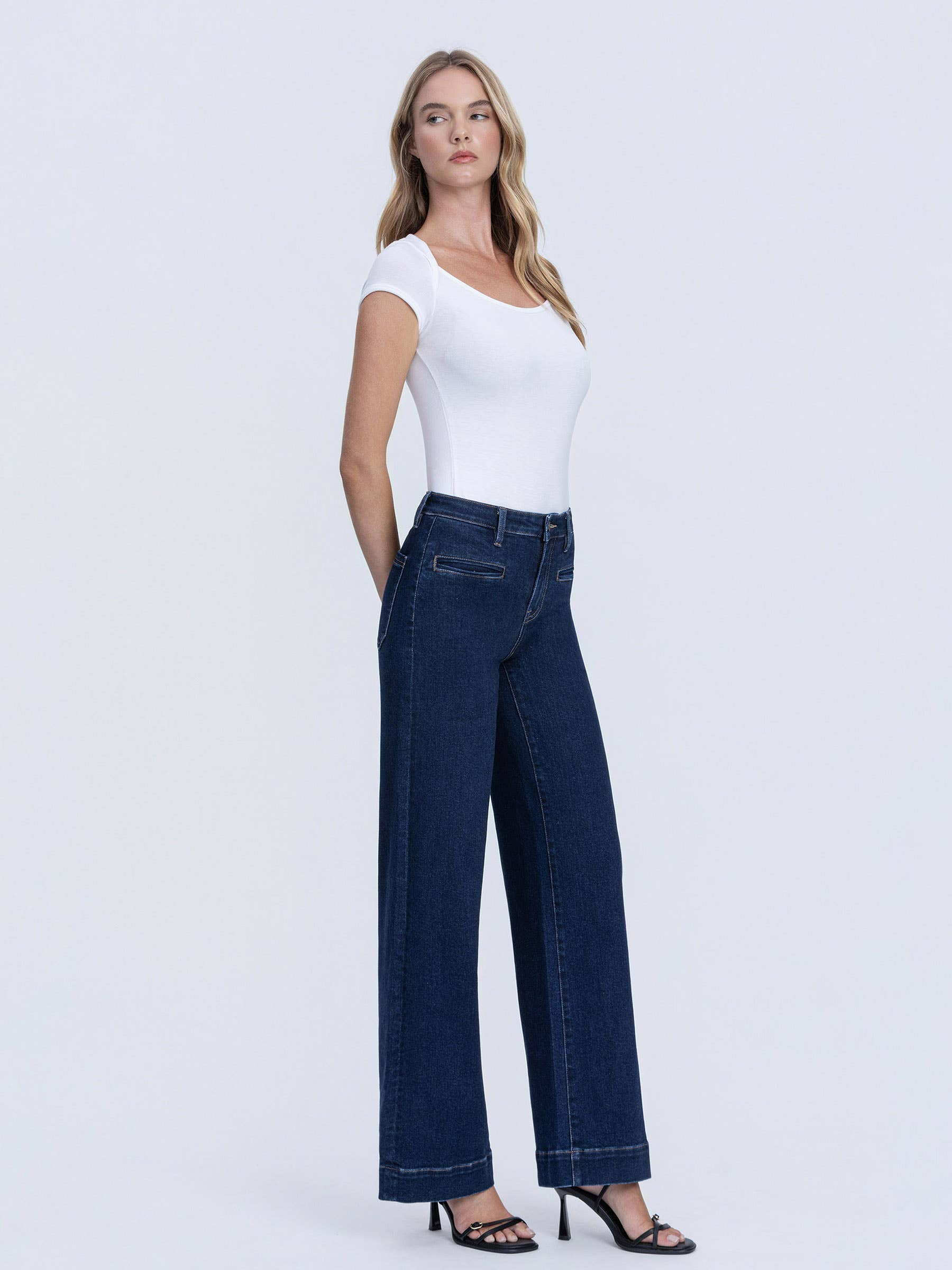 Side view of dark wash high rise wide leg jeans