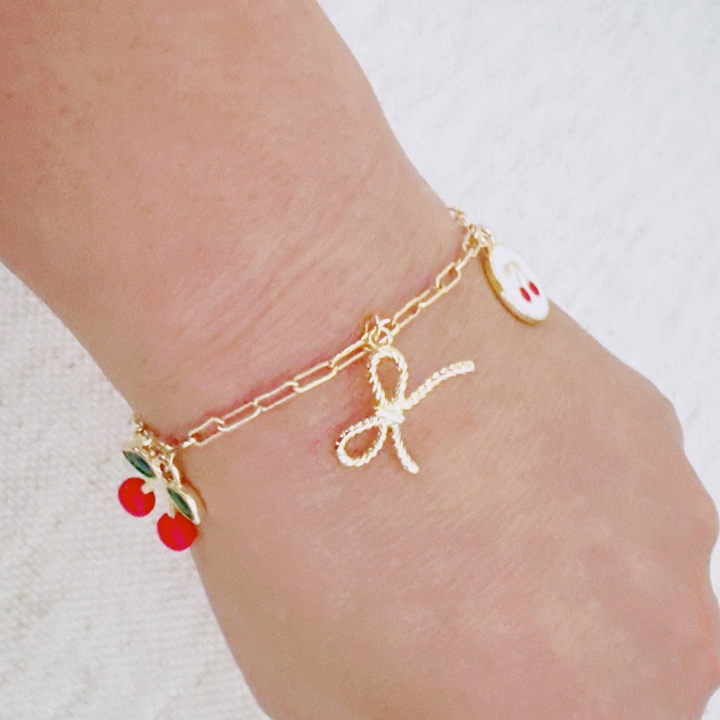 Cherry Chic Charm Bracelet – Bow, Cross & More