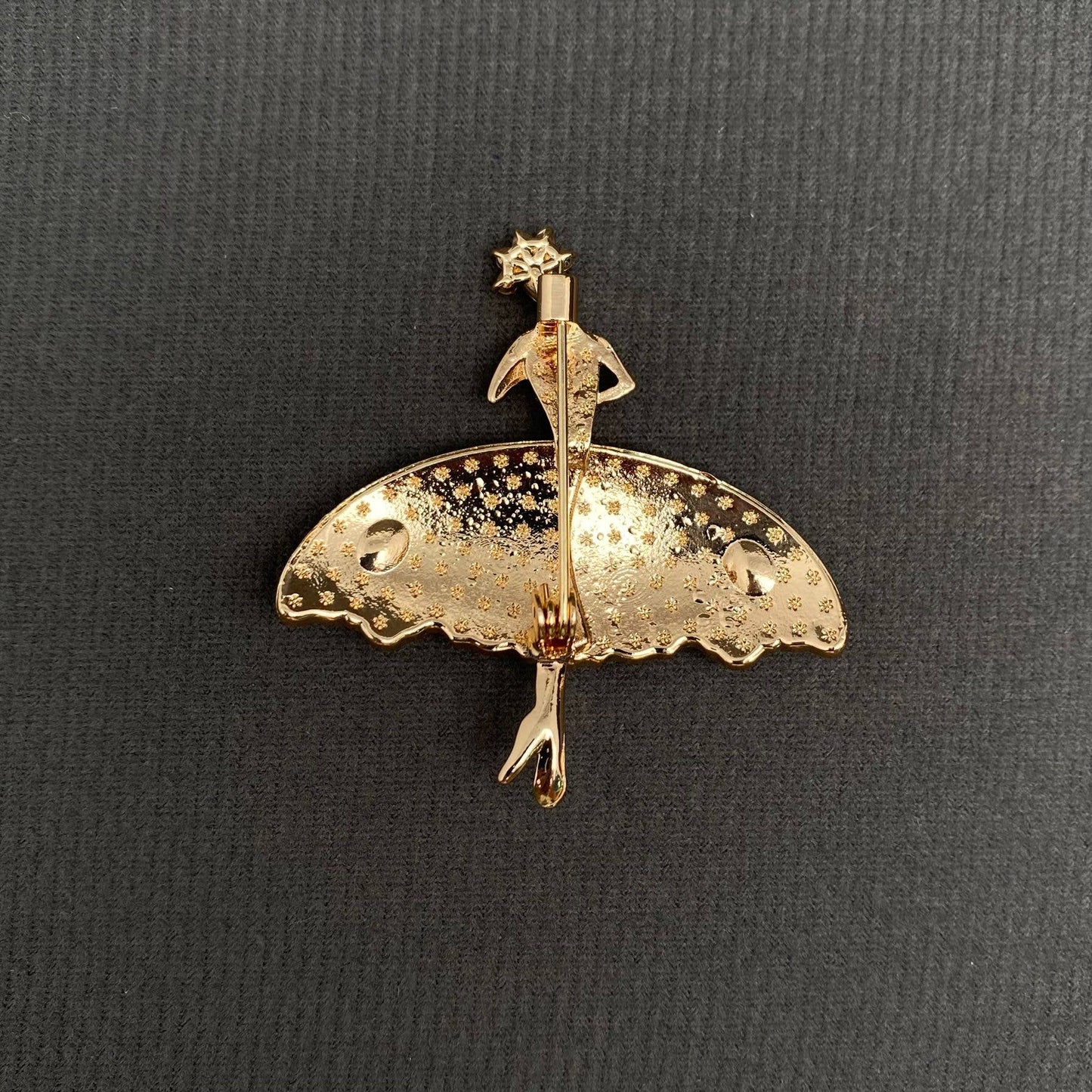 Back of gold ballet dancer brooch with pin clasp