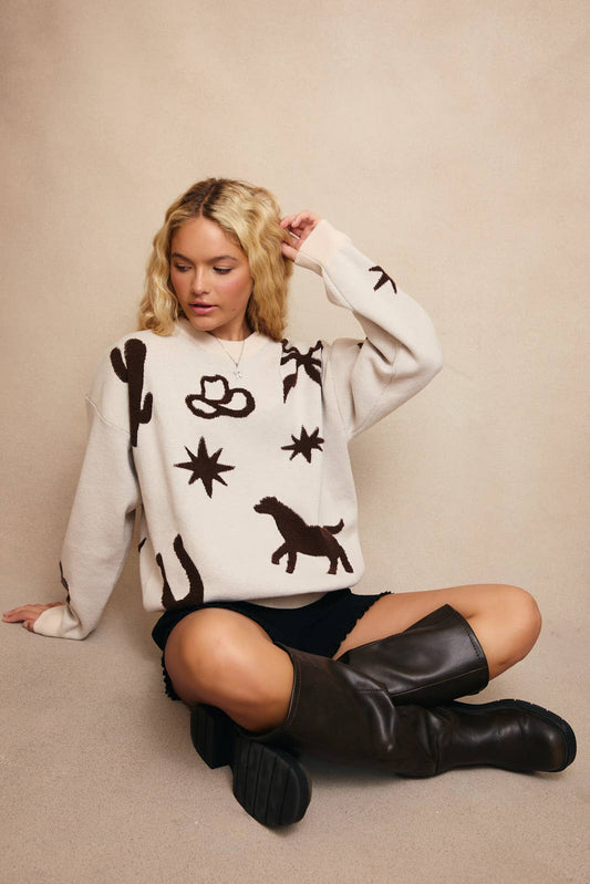 LONG SLEEVE CREW NECK MULTI COWBOY PATTERN SWEATER