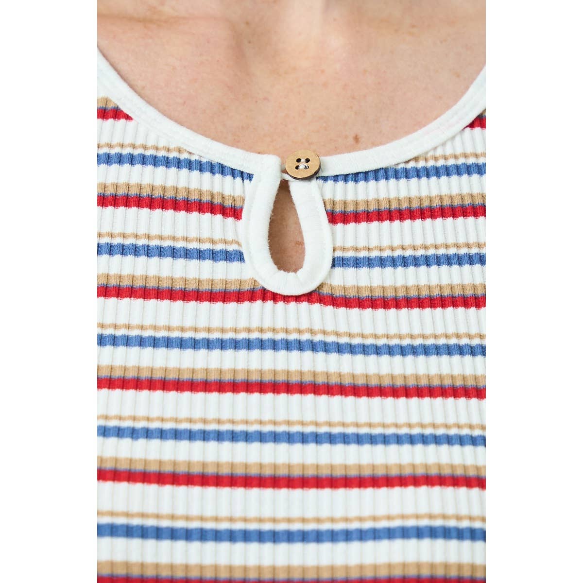 Close-up of a ribbed tank top with red, white, and blue stripes.