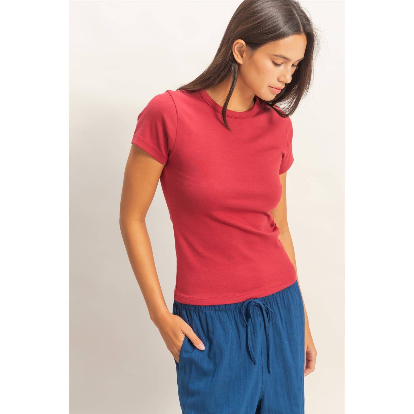 Rose crew neck short sleeve top styled with blue drawstring pants